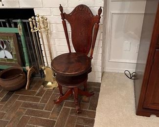 Amazing antique ornate  carved wood piano  chair! Yes, it rally spins up & diwn