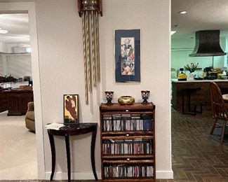 Modern remake barrister lawyers bookcase full of classical music CDs and some cassettes