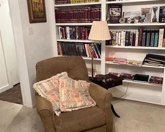 Comfy recliner, nice lamp and vintage or antique  side table.