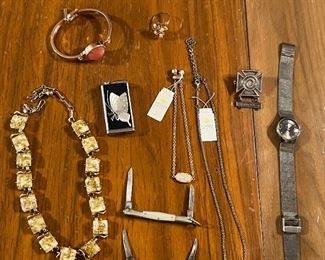 Kendra Scott, some tiny old knives, Skagen watch, vintage Coro lucite cubes necklace m, vintage cocktail coral ring, military metal.
