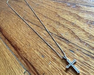 14k white gold and we think diamonds cross pendant on 10k white gold chain