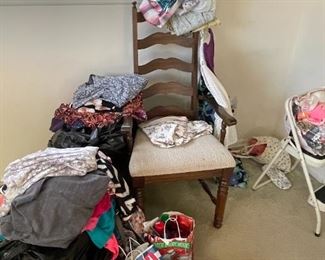 . .. ladderback chair and some clothing