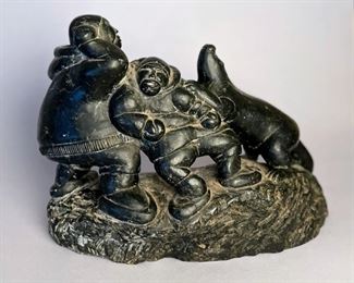 Joanassie Oomayoualook, (B. 1934),  E9 1749, Port Harrison/Inukj, Stone Carving Of Two Hunters And A Seal