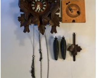 German Carved Wooden Cukoo Clock  NEEDS COMPLETE REPAIR TO CASE AND WORKS