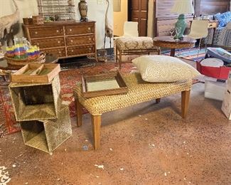 Good looking bench with woven straw top