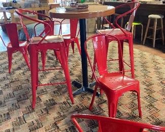 Super cute red chairs and high top table