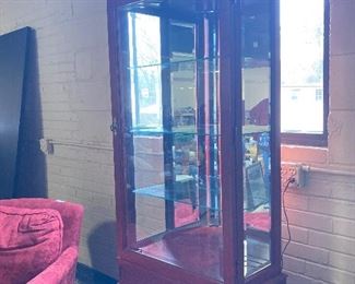 Oriental style red curio cabinet with light and glass shelves