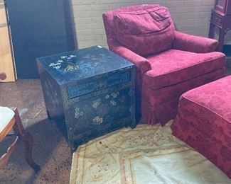 Oriental style chest and red chair