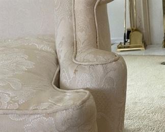 Antique Wing Back Chair with Claw Feet Upholstered in Neutral Damask Upholstery. Measures 33" W x 32" D x 42" H. Photo 2 of 4.
