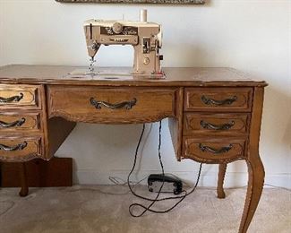 Vintage Sewing Table with Singer Sewing Machine. Photo 1 of 2. 