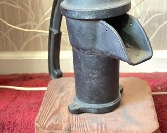 Vintage Pump Mounted on Wood. 