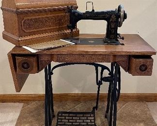 Antique Sewing Table with Machine. Photo 1 of 2. 