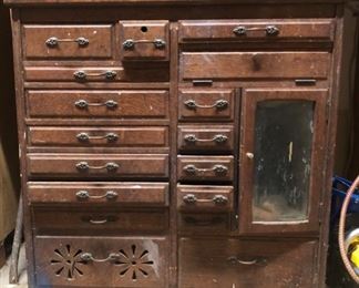 vintage dentist jewelry or collector cabinet