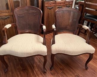2 Armed Cane Back Chairs