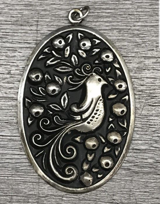 925 marked sterling silver International bird pendant 11.26 grams 
$60
