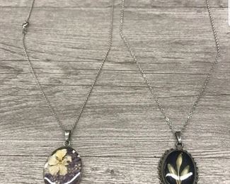 Sterling silver preserved flower pendant $40 each 