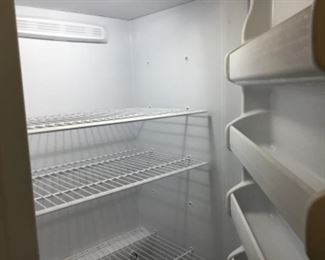 Inside of Frigidaire standing deep freezer