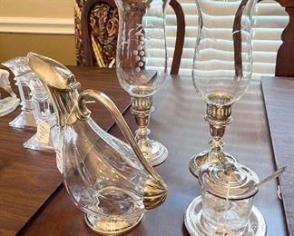 Reed & Barton Sterling Sugar Bowl, Saucer and Spoon $75, Weighted Sterling Candle Sticks $75 each and Bird Shaped Pitcher $45.