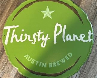 Thirsty Planet Tin Sign $25