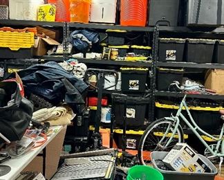 Packed Garage and Storage Units filled with Construction Equipment and Tools of all kinds.