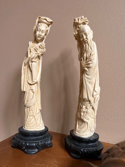 Pair of carved resin (faux ivory) Asian figures 