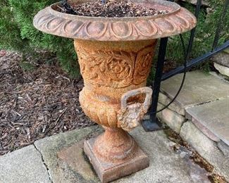 Cast iron footed outdoor urns 