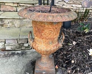 Cast iron footed urns 