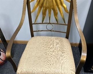 Designer sun burst gold leaf back, solid brush brass frame.