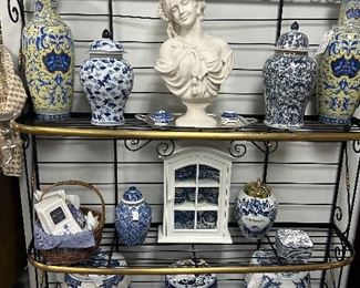Blue and white garden seats and vases, koi ginger jar.