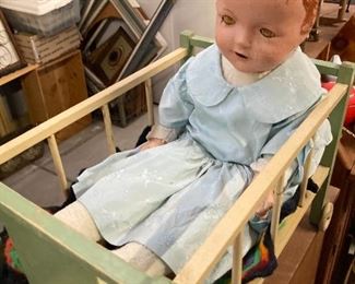 Old doll and crib