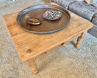 Early American pine coffee table with drawer and casters