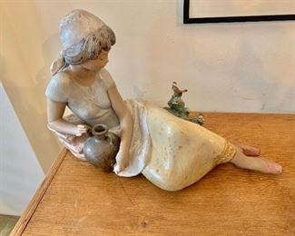 Lladro reclining woman with bird 