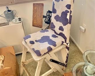 Vintage chair ironing board with cow print