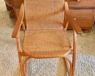 Vermont Tubbs wood and woven rattan rocker 