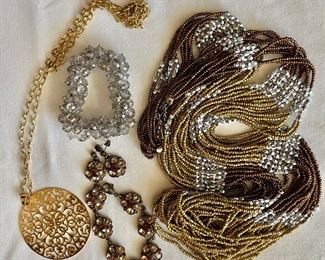 Beaded necklace and gold tone necklace and bracelets 