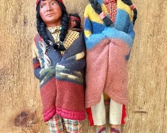 Native American Dolls signed on foot 