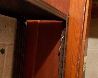 Very vintage ironing board in wood cabinet 