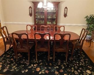 $350. Queen Anne style Table with 2 leaves, table protector pads, 8 chairs. Overall very good condition. Measures 66" long + 2 - 15" leaves. 44" wide. 1 captains chair 7 regular chairs. 