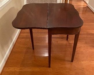  $150. Flip top Game Table. Measures 17.75" x 36" wide x 31" tall. Overall very good condition. Does have a dent that has been restained - see photo. 