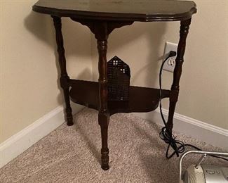 Small side table - sturdy but lightweight. Measures 10.5" deep x 21" wide x 23.5" tall. 