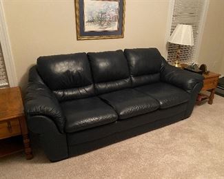 $350. Blue Leather Couch in excellent condition. (Natuzzi Leather?) Cushions do not come off. Located on the 2nd story so we will have to get it down a flight of stairs.  Measures 34" deep x 88" long x 34" Floor to top of Back. 16" floor to seat. 