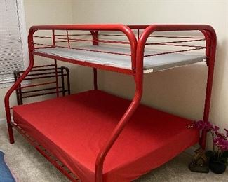 $100. Painted Red Metal Bunk Beds twin over full. You're welcome to take the mattress but it is older. 