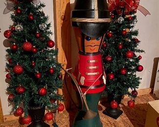 $15 each. 2 small trees for porch decorations. Nutcracker is made of terra cotta pots - $30. 
