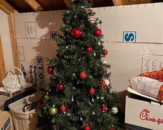 $40 pre-decorated artificial Christmas tree. 