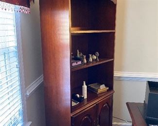 $175. (Part of a 6 pc set) 2 - Display shelves with doors at the bottom. Measure 17" deep x 30" wide x 77" tall. 