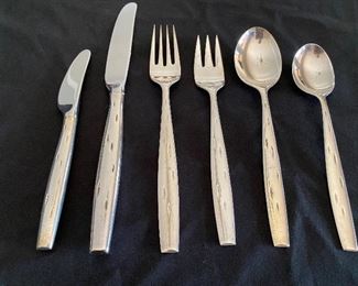 $1800. Service for 8 + serving pieces. Wallace Sterling "Discovery" pattern. 