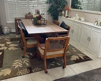 Dining table with six chairs from Tell city company