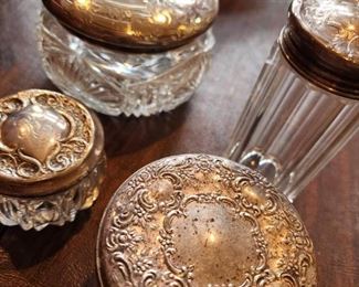 Antique Sterling Silver Top Glass Bottles/Jars exception is the jar at the forefront. 