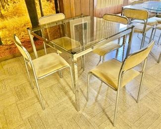 4 vintage glass top and chrome tables availavle; 16 vintage Made in Italy chairs available