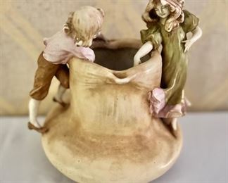 Boy and girl porcelain  pitcher 